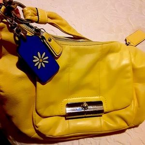 - Authentic Coach Kristin Satchel